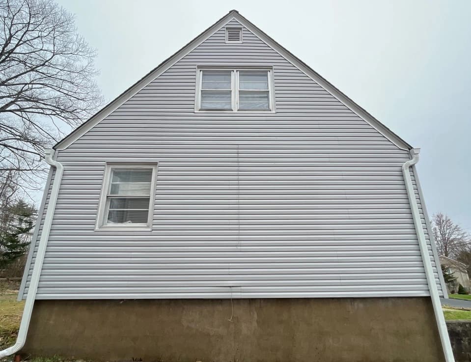 Macedonia Power Washing technician performing detailed house washing in Macedonia residential area